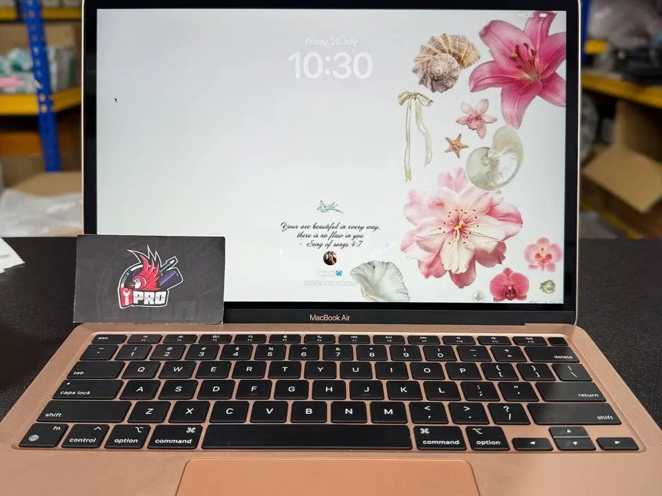 Gold MacBook Air booted to the lock screen after a repair